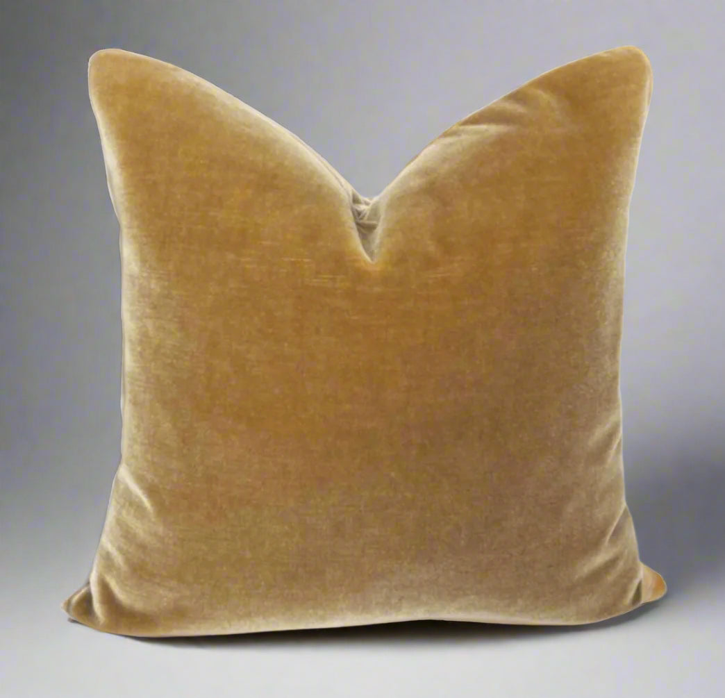 A camel brown mohair pillow cover with a hidden zipper, designed for couch or sofa pillows.
